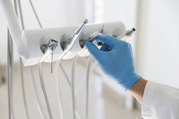 Professional Tooth Extraction technician working in Richmond West, FL